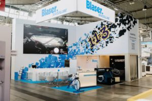 Messestand von Blaser Swisslube auf der AMB Stuttgart 2026 – realisiert von Protec Messebau